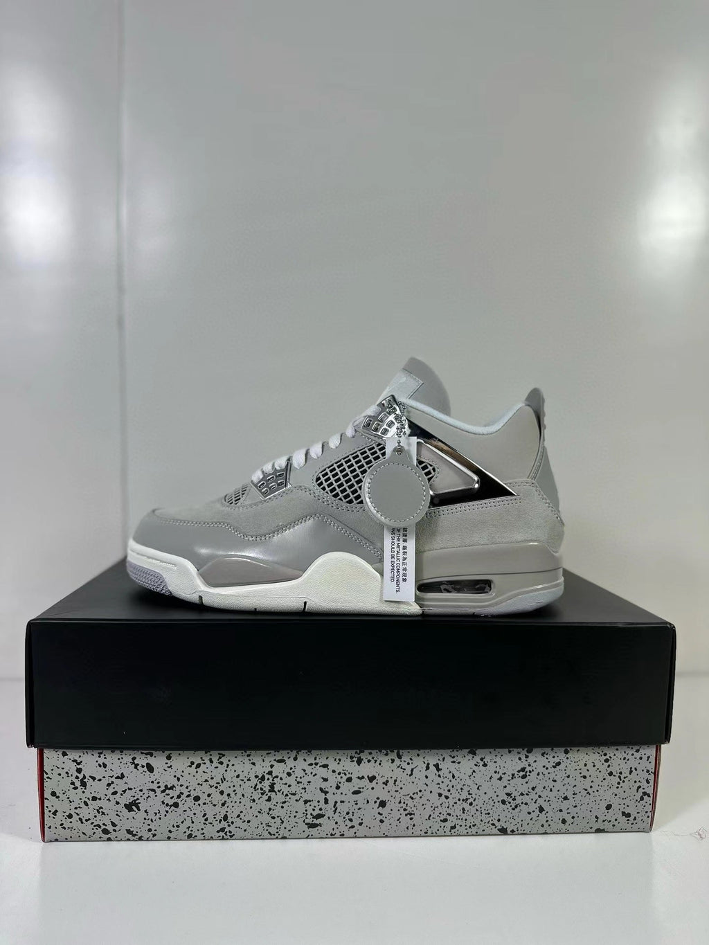 Jordan Air Jordan 4 Light Iron Ore Frozen Moments Sneakers